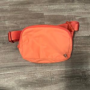 Lululemon orange cross body belt bag